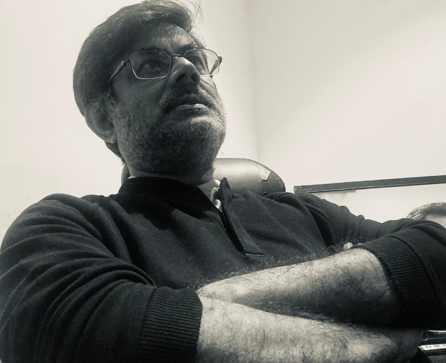 Black and white portrait of editor Sujay Datta Ray.