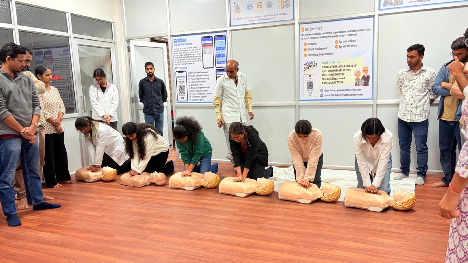Trainee practising CPR in a hands-on caregiving skills session
